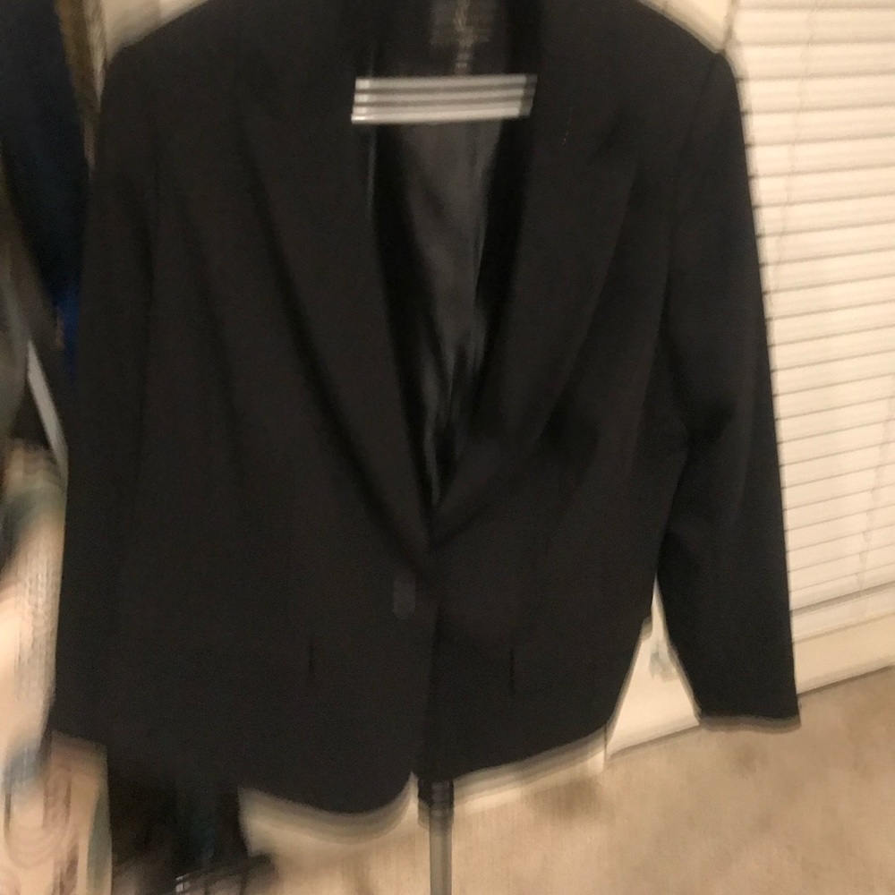 Woman’s black blazer make an offer